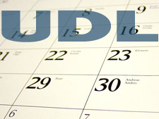 Monthly calendar has the words "UDL" written over it