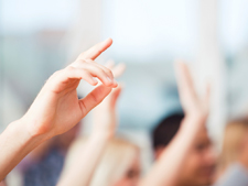 Students' hands are raised showing how to come to class prepared