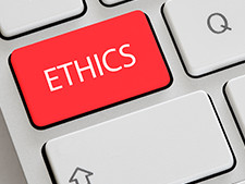 Computer keyboard key displays the word "ethics"