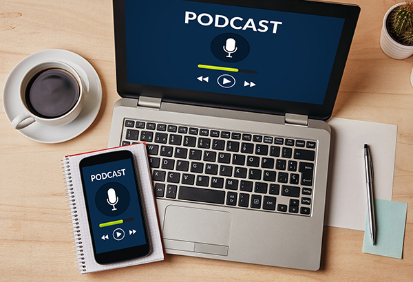 Podcast icon and clip is featured on computer screen and phone