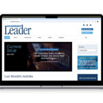 laptop displaying the Academic Leader homepage