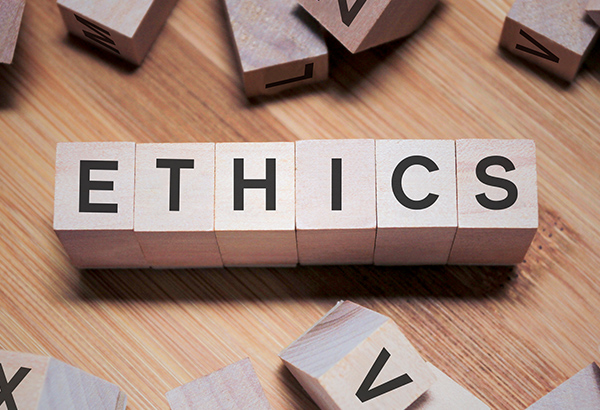 Blocks spell out the word "Ethics"