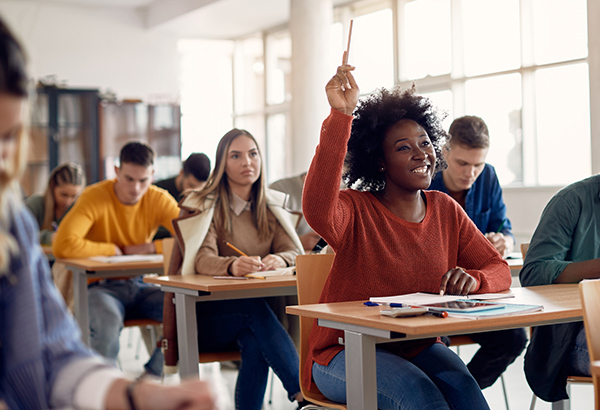 student-raising-hand-in-class