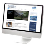 computer with the Academic Leader website on screen