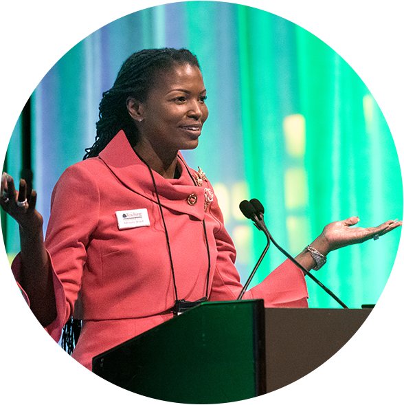 plenary speaker at a podium