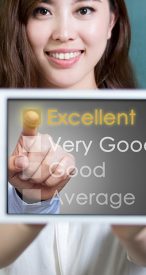 Snippet_Image-_mos-evaluating-online-4-18-17-newsite Female holds up device with options displaying
